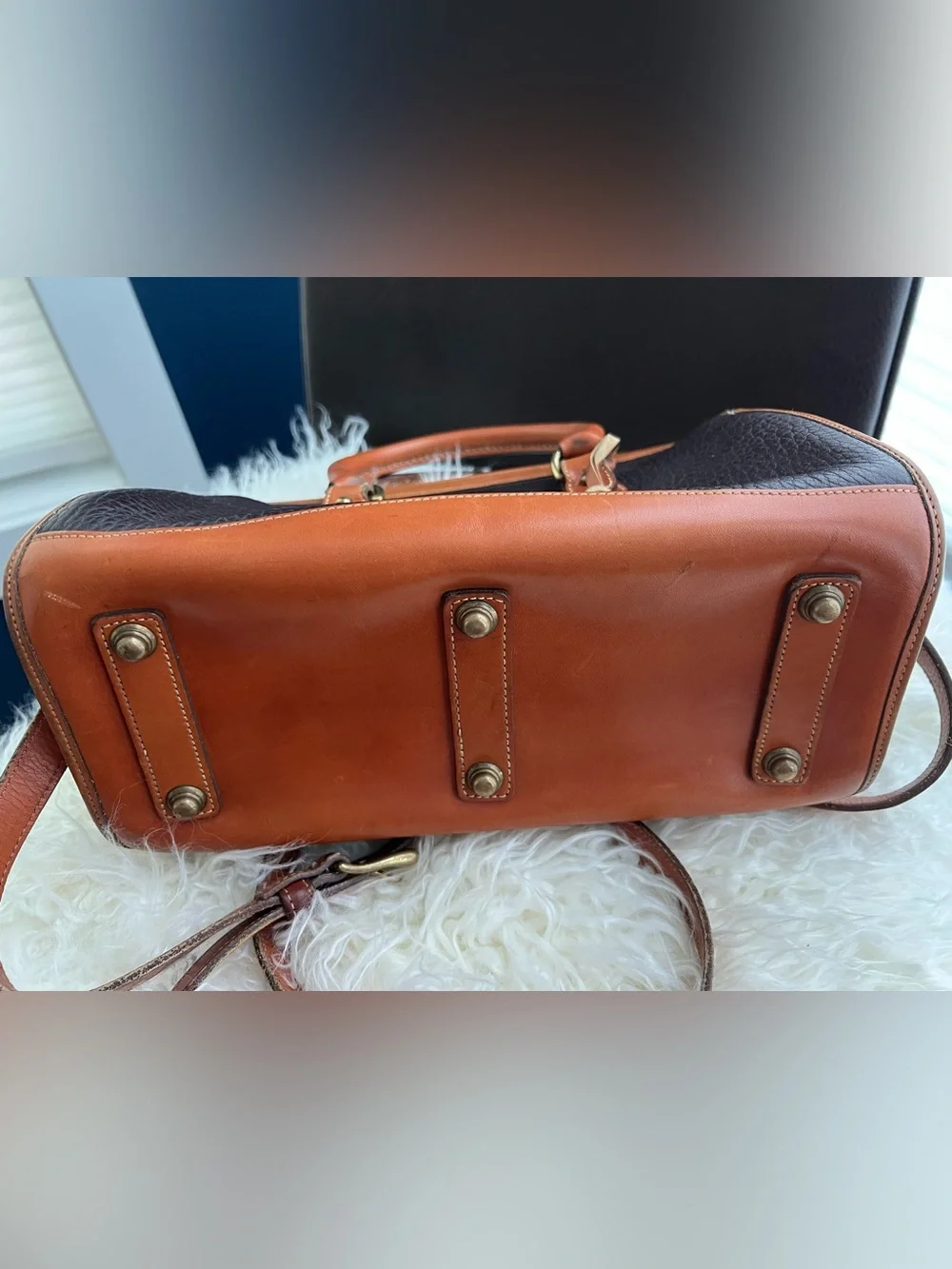 Dooney & Bourke VINTAGE black pebbled Leather satchel with British tan trim.